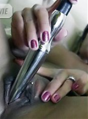 Sexy Asian MILF Tia tweaking her nipples while fucking her pussy with a vibrating toy